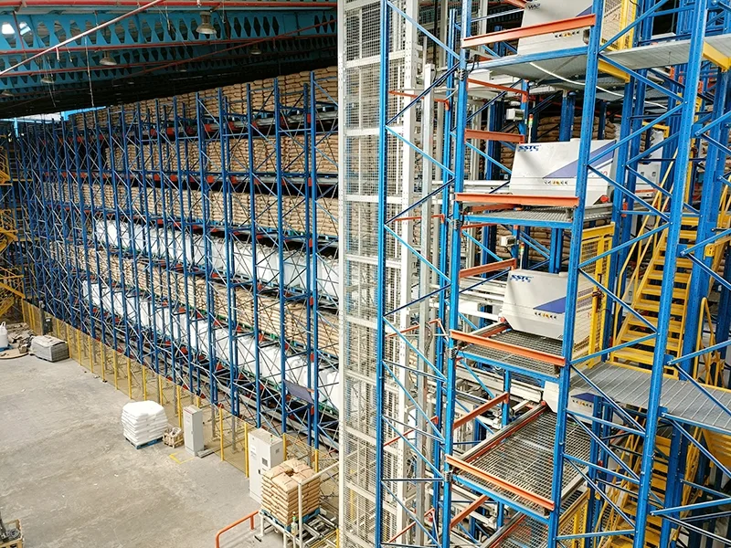 SSTC heavy-duty shuttle carrier system and radio shuttle mover executing multi-level pallet handling in a high-density automated warehouse