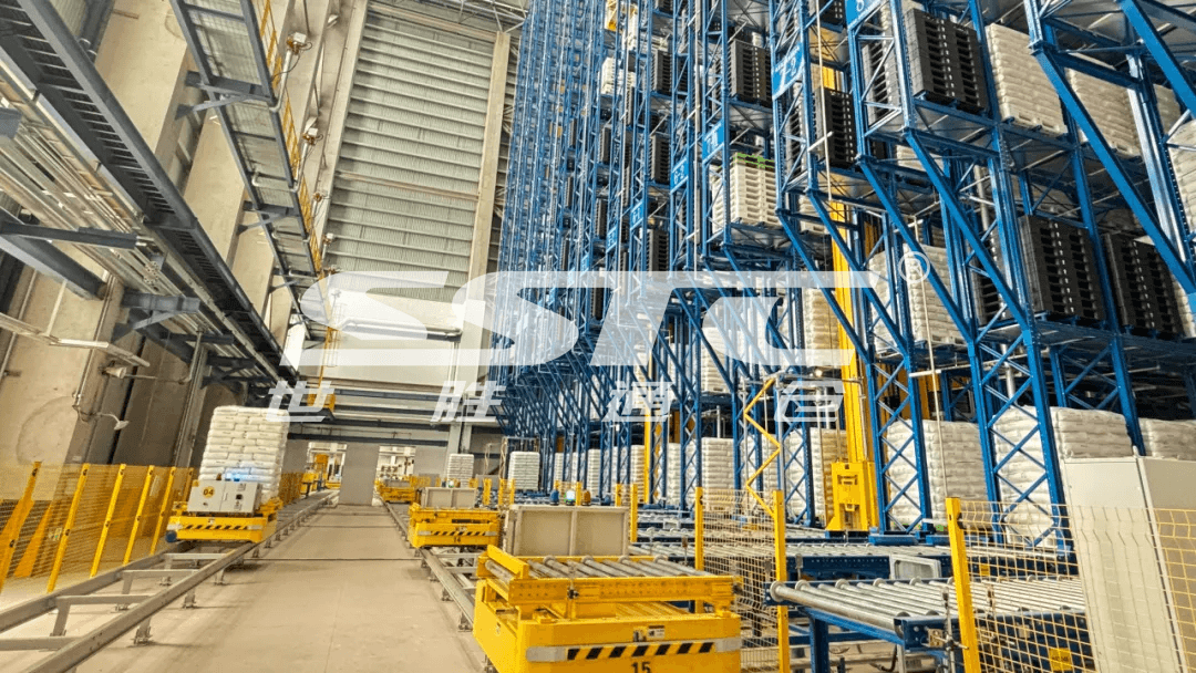 High-bay unit-load AS/RS stacker crane operating in a secure chemical industry storage facility