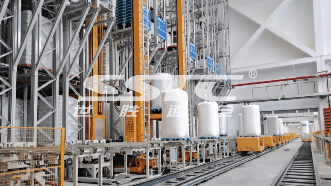 High-bay unit-load AS/RS stacker crane operating in a secure chemical industry storage facility