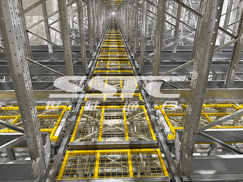 Winterized robotic shuttle operating autonomously within a high-density Four-Way Pallet Shuttle Storage racking grid