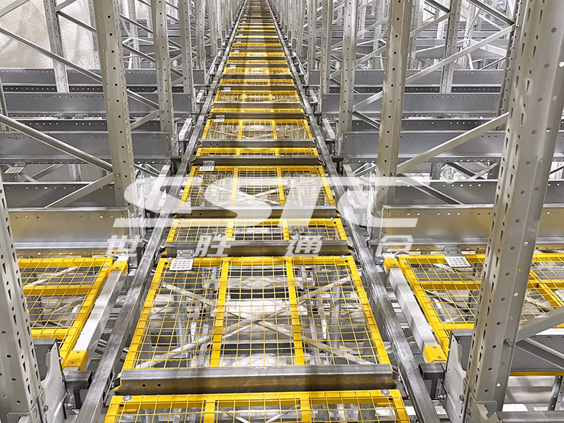Sub-zero cold chain four-way pallet shuttle robotics engineered by SSTC Intelligence for high-density frozen warehouse operations