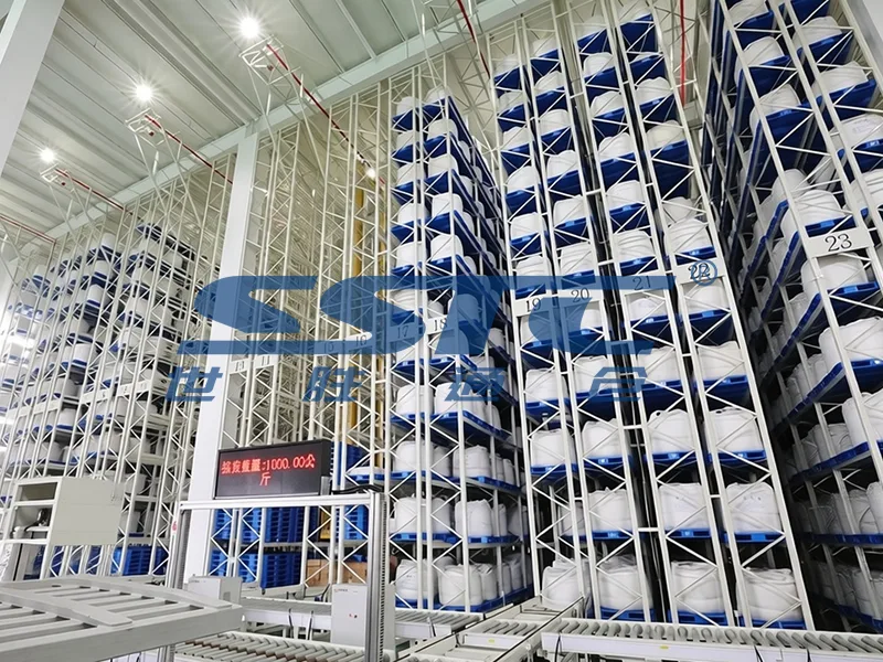 High-speed outbound dispatch staging conveyor and automated stretch wrapping station linked with Double-Deep Pallet AS/RS engineered by SSTC Intelligence