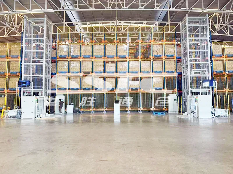 SSTC Intelligence 4-way shuttle robot operating inside a high-density ASRS pallet racking system warehouse.